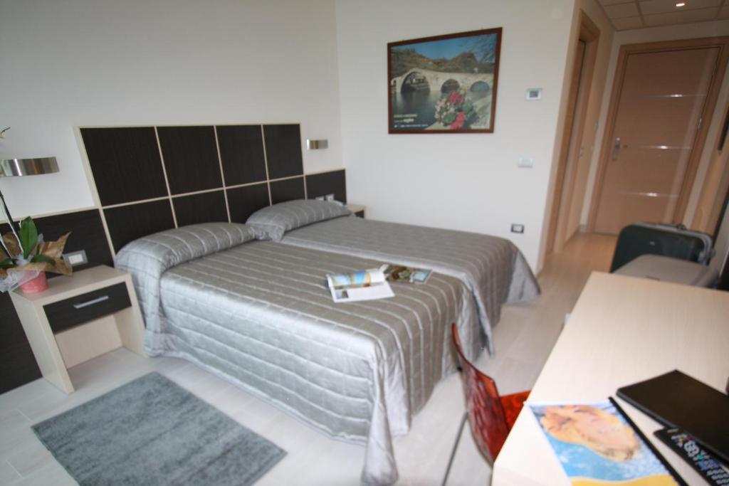 Hotel Garni Corallo Torbole Sul Garda Rom bilde